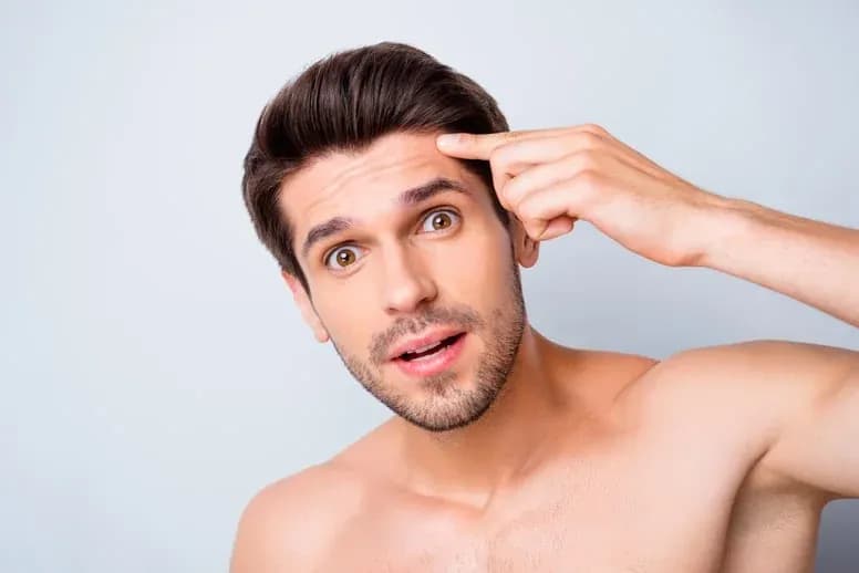 Pryszcze na czole od czego - poznaj przyczyny i skuteczne rozwiązania